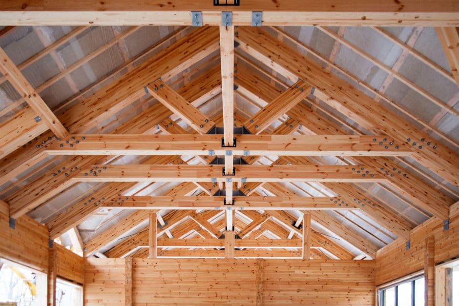 roof construction of big wooden trusses closeup